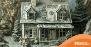 A miniature paper house constructed out of money to represent how you can calculate your mortgage payment